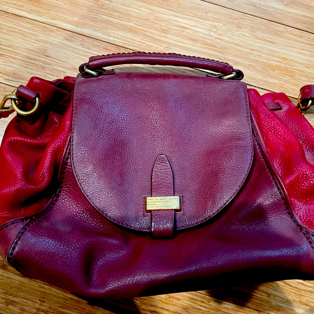 Red/cabaret Marc Jacobs bag.